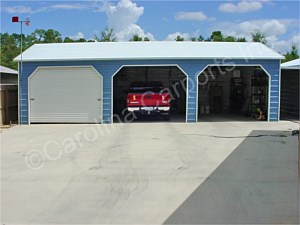 Boxed Eave Roof Style Fully Enclosed Garage with Three Garage Doors